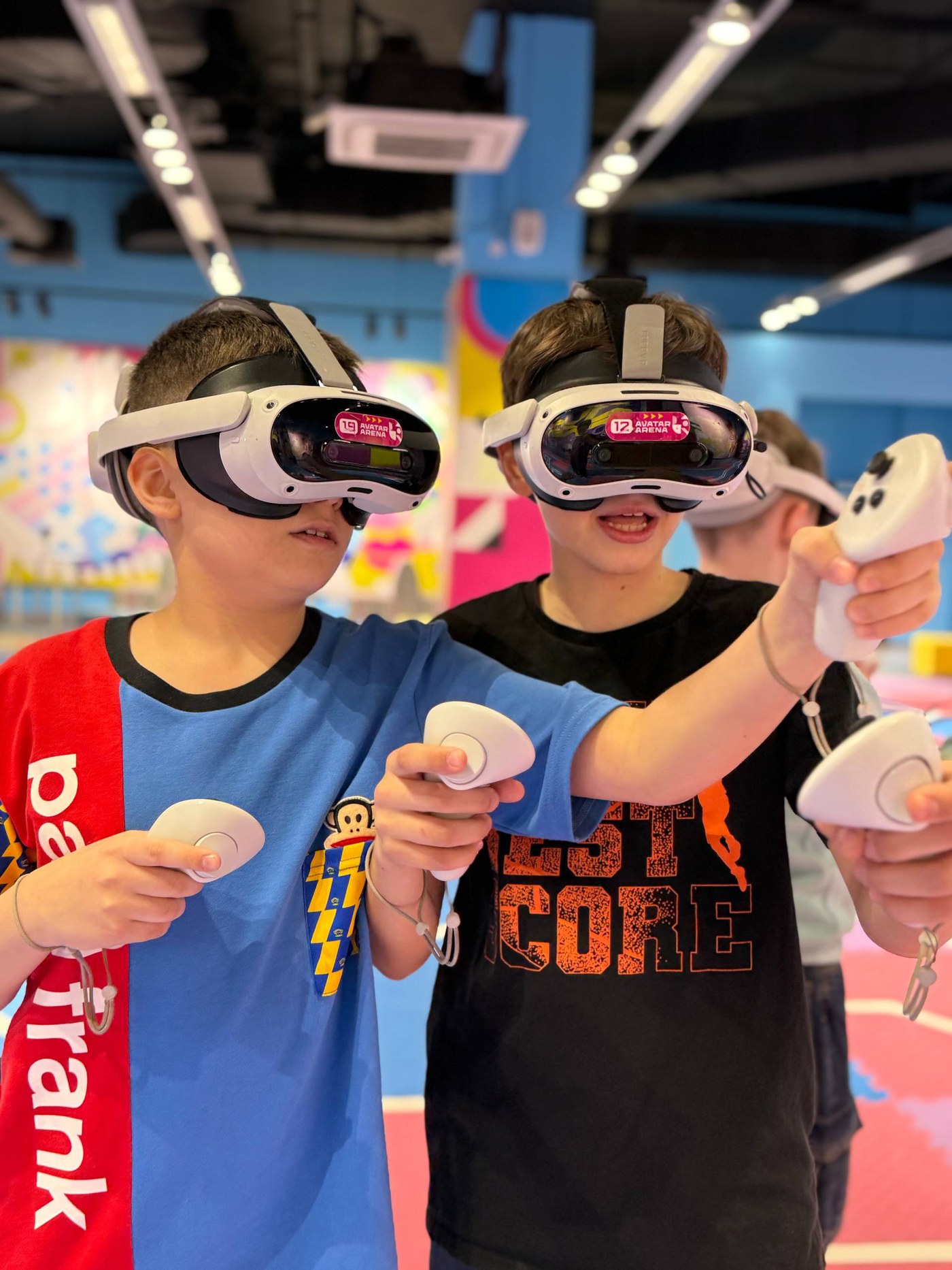 Kids playing a VR game together