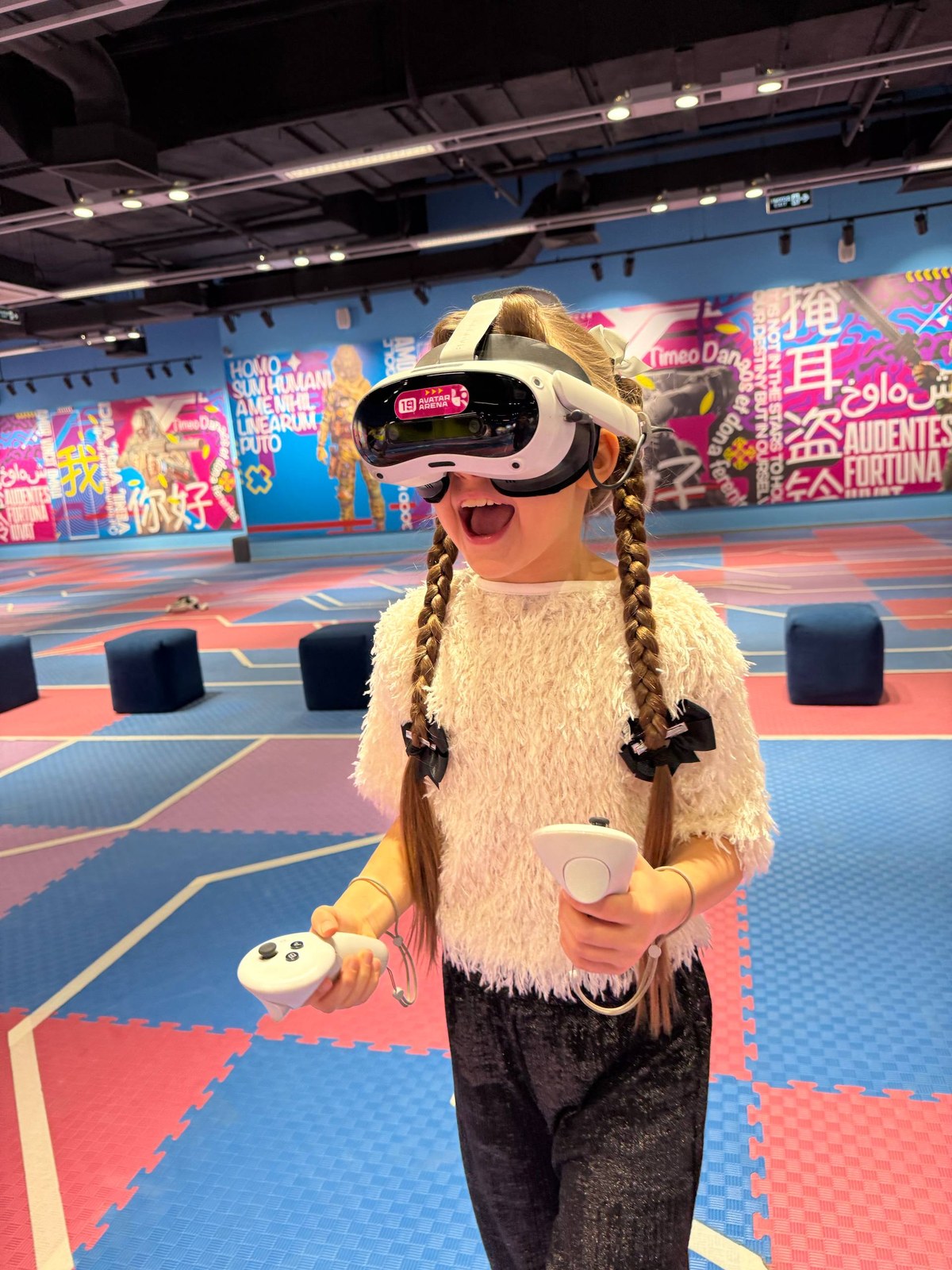 A guest playing in a VR arena