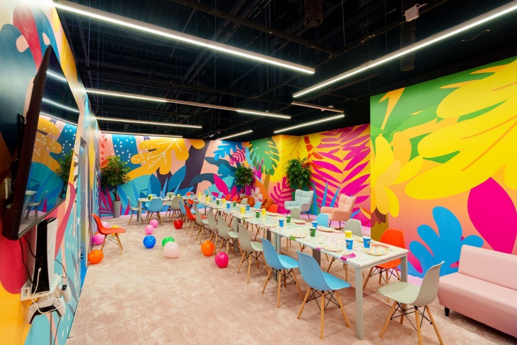 Tropical party lounge with tables and chairs