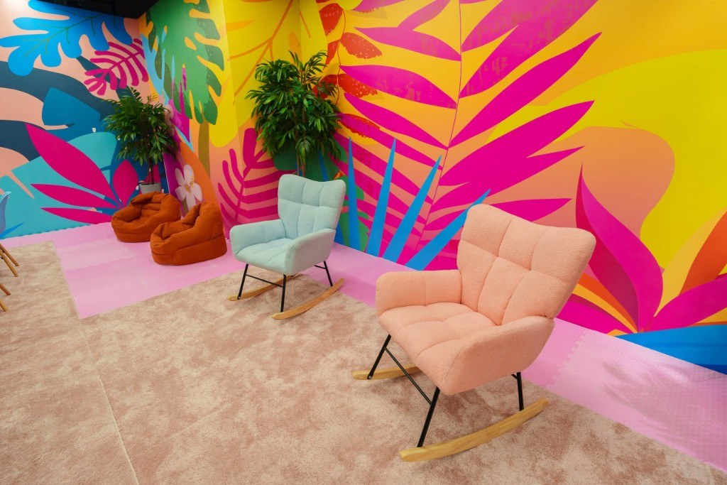Lounge chairs in a colorful party room