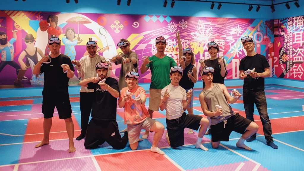 A group celebrating together in a BATTLE START VR arena